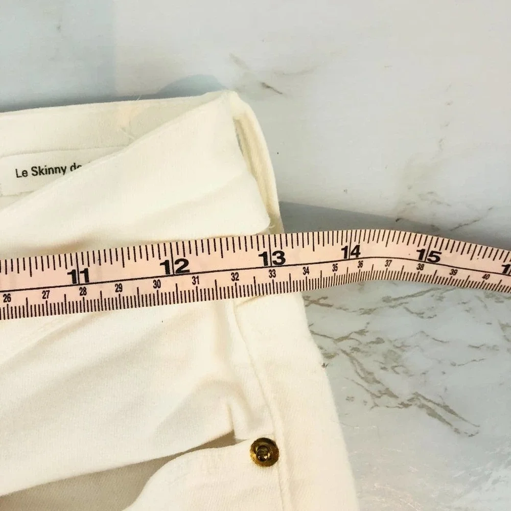 NWOT FRAME LE SKINNY DE JEANNE DISTRESSED RAW HEM JEAN 27